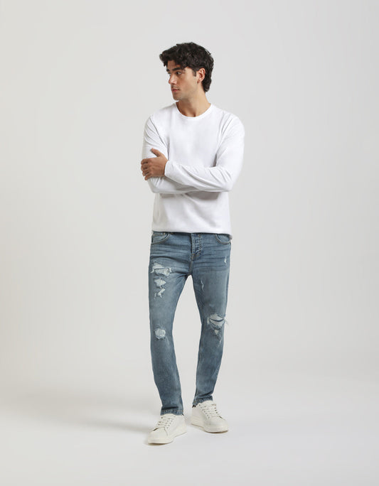 Jeans regular fit con strappi